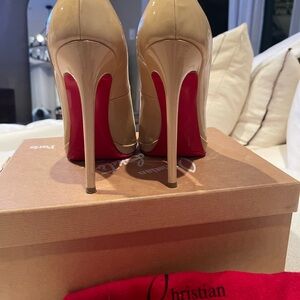 Christian Louboutin Beige Heels with Red Soles